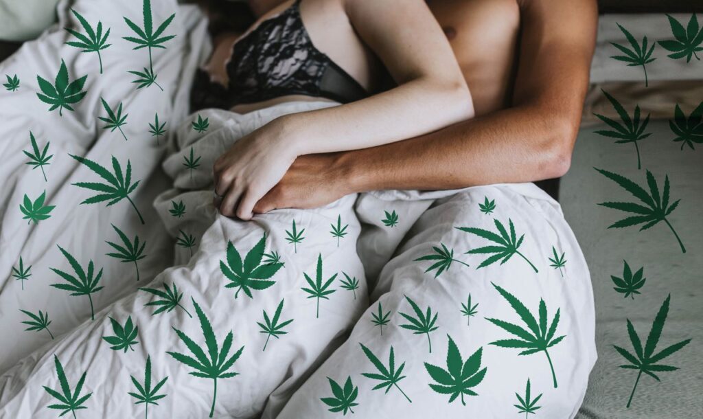 Couple in bed with cannabis print sheets